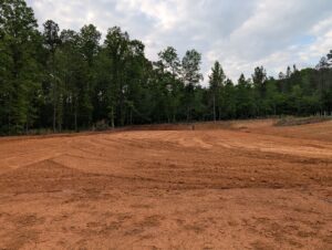 Full-size 20m x 60m outdoor dressage arena nearing final stages
